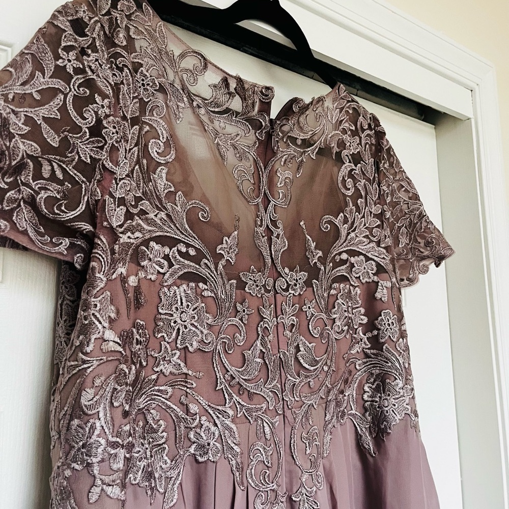 Full length gown, not worn, not altered, with tags.